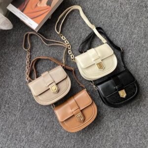 Buckle-Flap Saddle Bag – Tan With Chain Accent